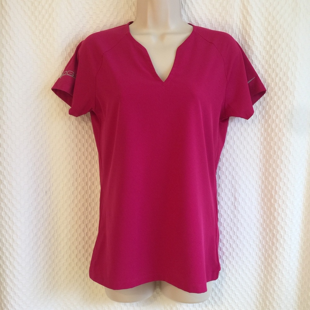 Nike women’s golf shirt pink S. #311